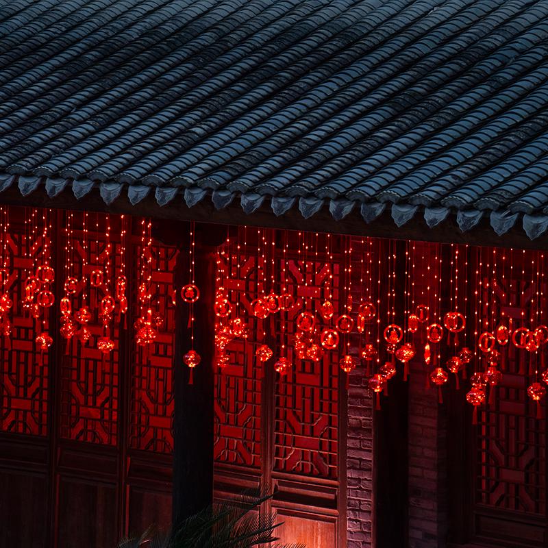 Spring Festival LED Red Lantern Ornaments: Solar Fu Character Colored String Lights for New Year Balcony Decor.