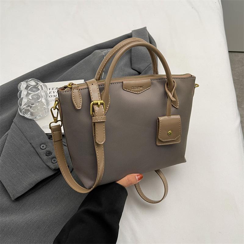 

Quality Branded Top-handle Bags For Women Oxford Cloth Mini Shoulder Shopper Tote Bag With Pendant Designer Handbags Luxury 30x20x12cm