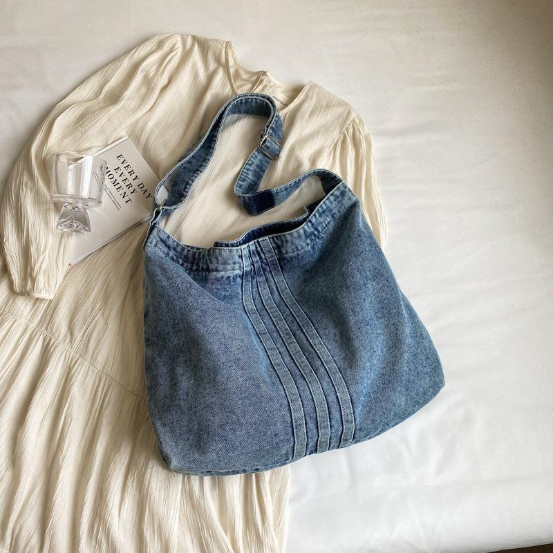 

Ленивая выстиранная джинсовая сумка женская 2025 новая литературная холщовая сумка через плечо большая вместимость повседневная модная сумка синий