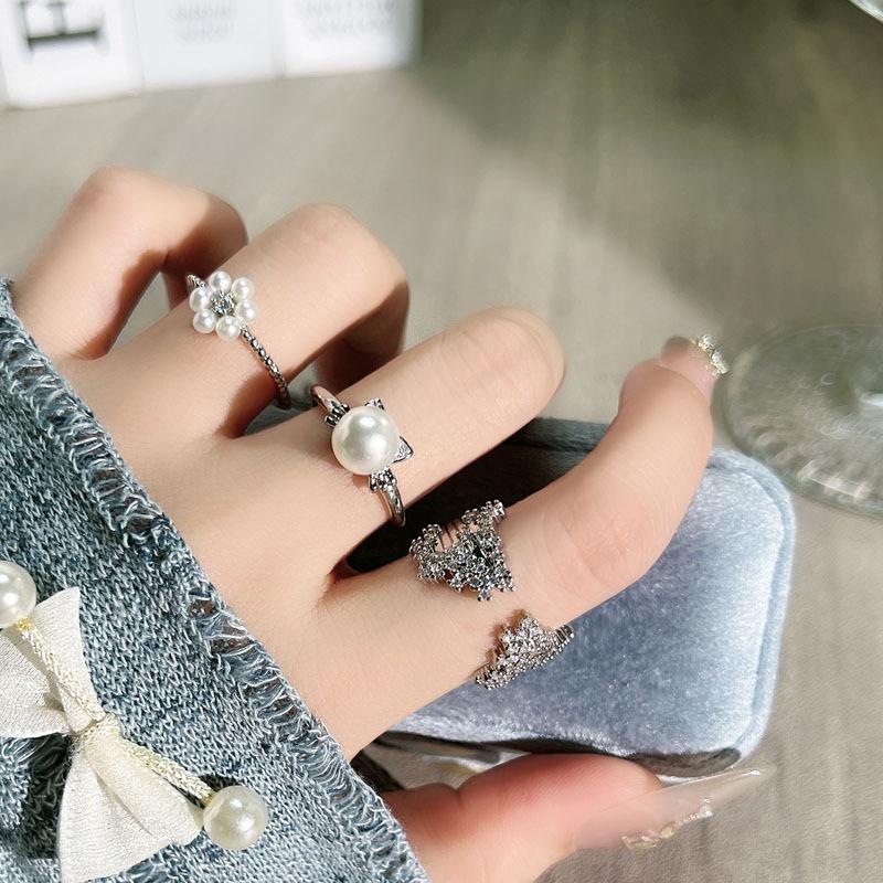 Sweet kitten pearl flower fashion open ring female Korean simple niche design sense exquisite fashion ring
