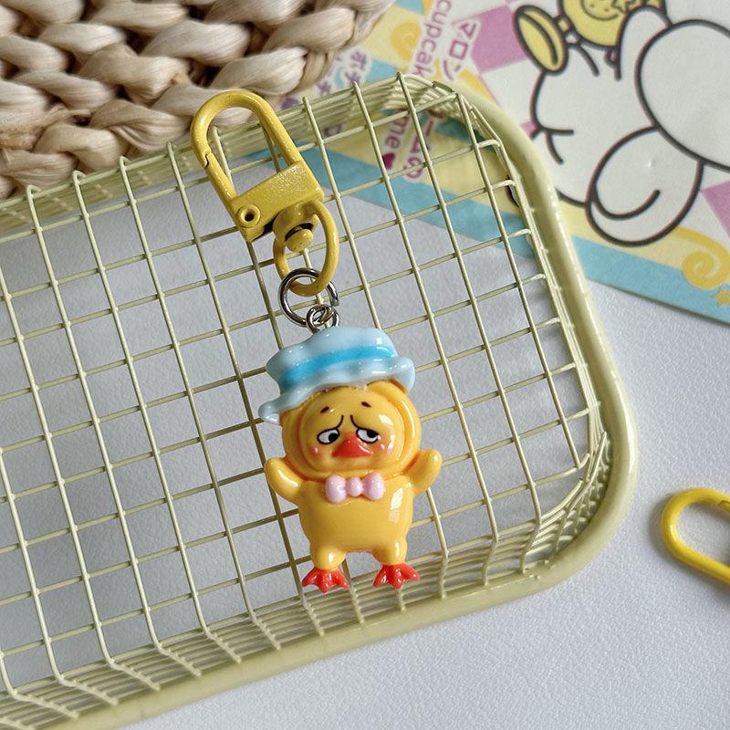 Kawaii Upsetduck Yellow Duck Resin Doll Keychain Pendant Keyring For Girls Backpack Charm Headphone Case Accessories Couple Gift