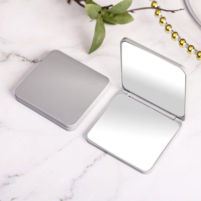 Compact Double-Sided Folding Makeup Mirror - Portable and Stylish for Students