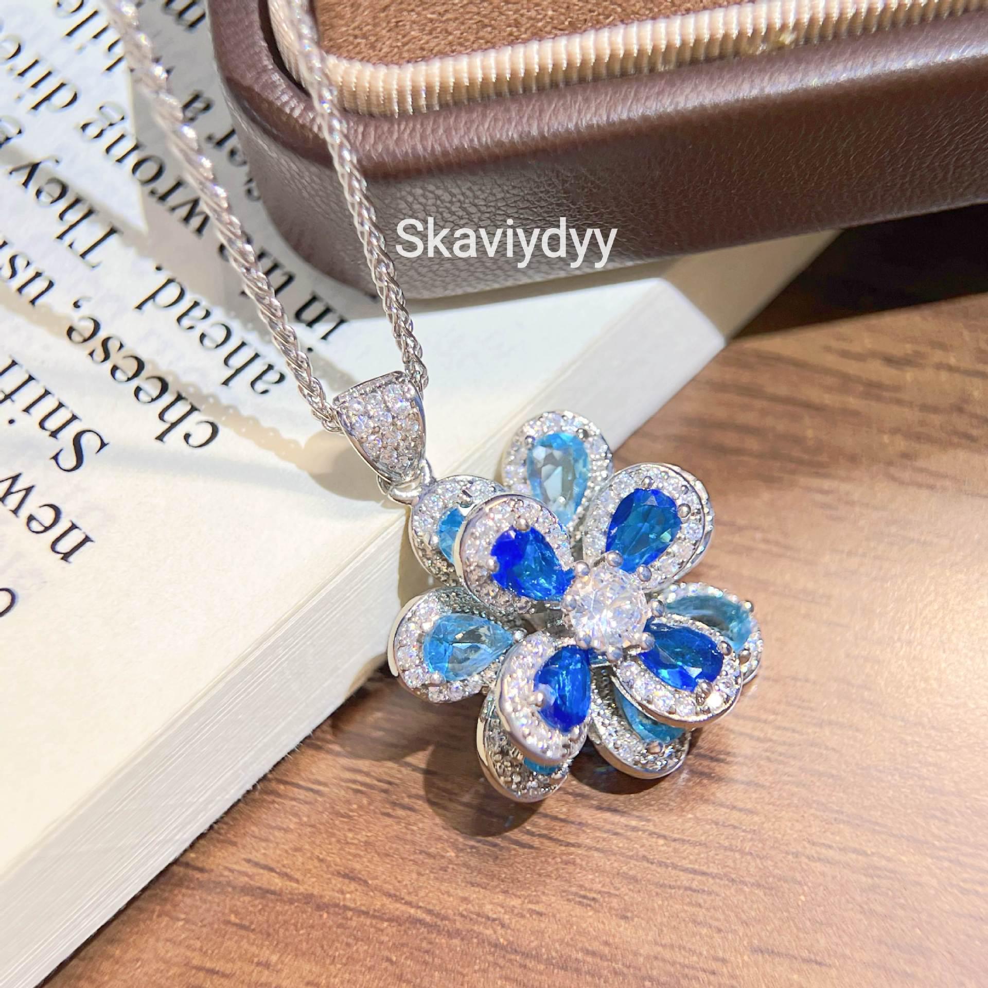 

Haute Couture Sapphire Zirconia Earrings & Camellia Flower Pendant Set