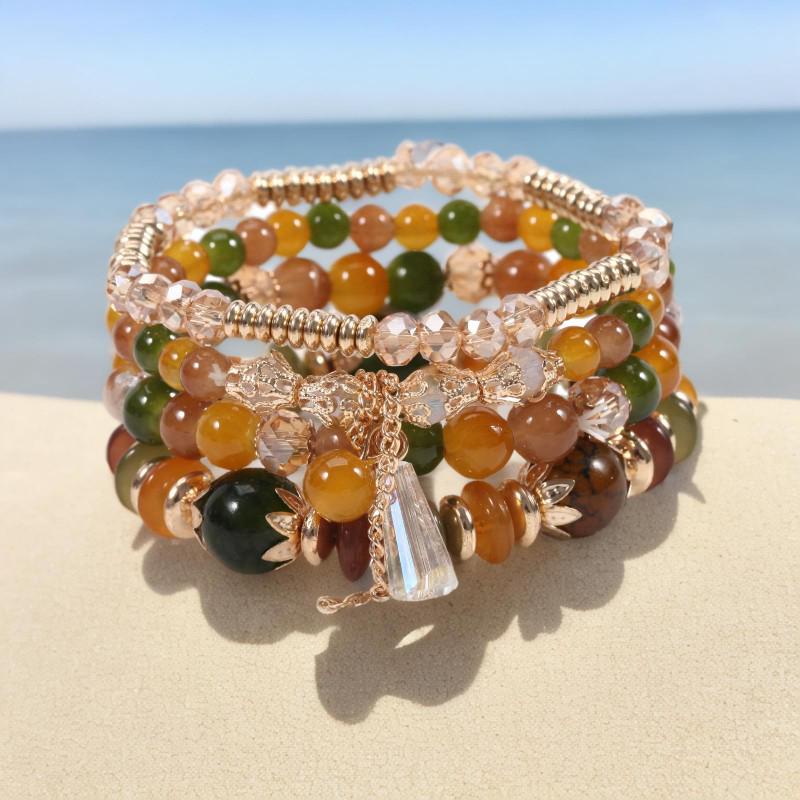 

Шикарный женский браслет в стиле бохо с четырьмя слоями стеклянных бусин и кисточками