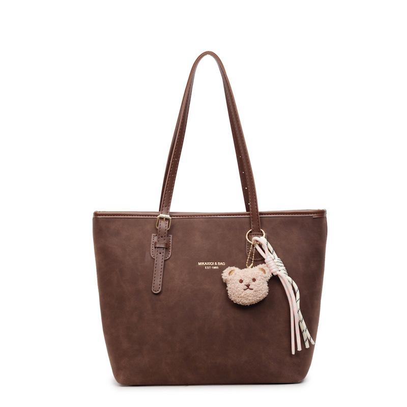 

Korean version of simple temperament large-capacity commuter shoulder bag women s fashion small fresh foreign style underarm tote bag No pendant темно-коричневого кольору