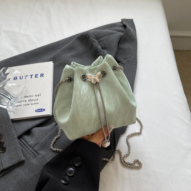 

Premium sense portable bundle bucket bag women s 2025 summer new trendy chain shoulder bag niche simple satchel