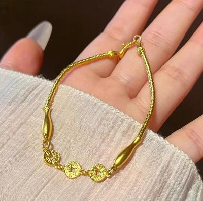 Vietnam Sandgold Kleines Goldfisch Armband: Modischer, Vielseitiger und Stilvoller Modeschmuck in Goldoptik für Damen