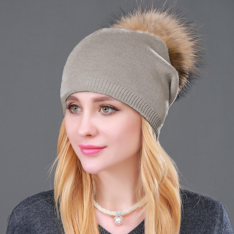 

Autumn & Winter Women s Knitted Wool Hat with Raccoon Fur Pom-Pom - Stylish, Warm, Pullover Design.