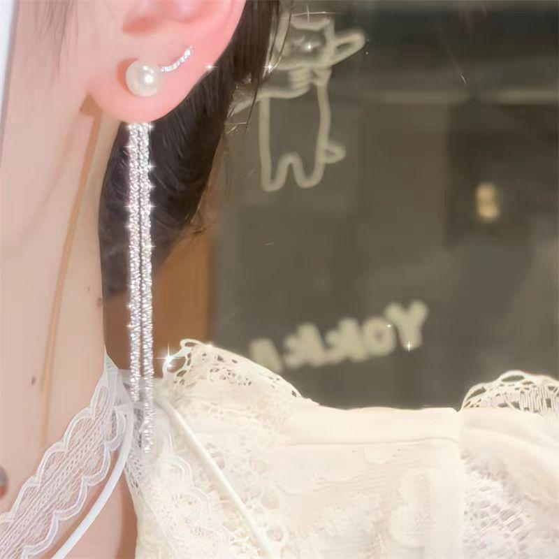Elegant Long Pearl Tassel Earrings for Women - Slimming, High-End Design for Round Faces, New Niche Goddess Collection.