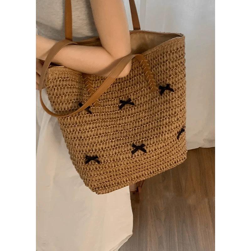 

Summer fashion large capacity straw bag women s backpack 2025 new bow tote bag vacation wind woven bag