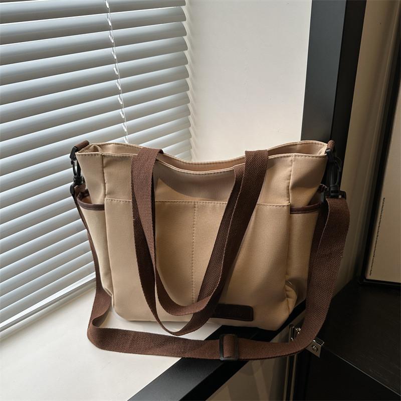 

Trendy Black White And Khaki Canvas Tote Bag For Women Ideal For Daily Wear And Fashion хакі