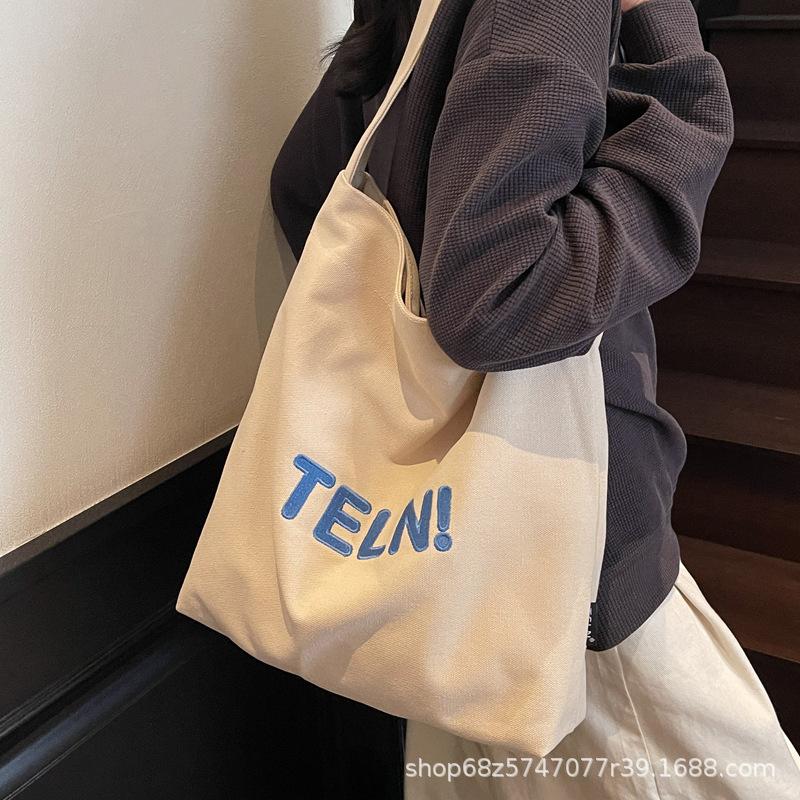 Shoulder bag, women's printed canvas bag, street large-capacity student bag, casual literary trendy brand canvas bag