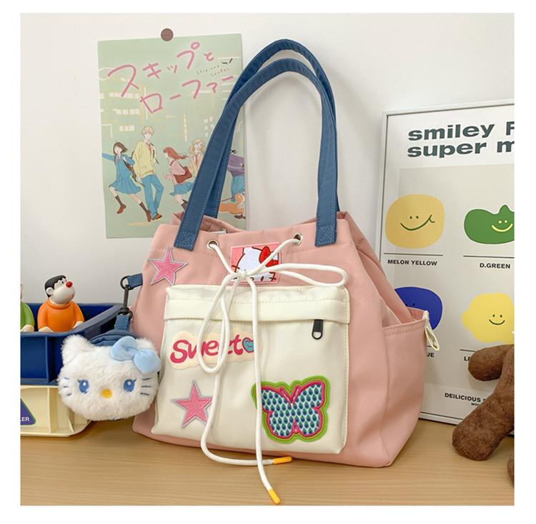 

Оригинальная холщовая сумка Y2K girl star macaron нишевая дизайнерская большая вместительная дорожная сумка розовый