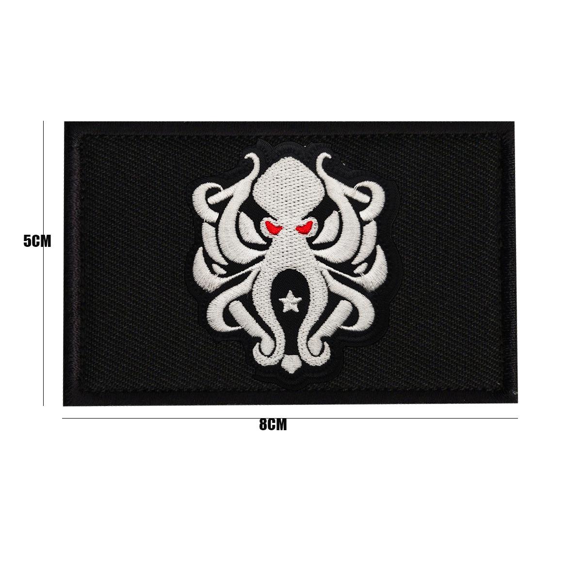 Dark Zone Breakout Game Patch: Black Gold & White Wolf Velcro Morale Badge by International Arm Co.