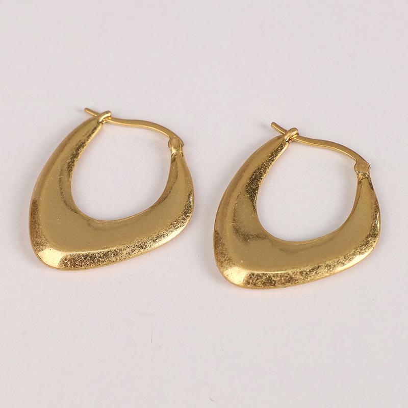 

Brass plated k real gold Bansha high color retention European and American high-end earrings irregular retro light luxury earrings earrings