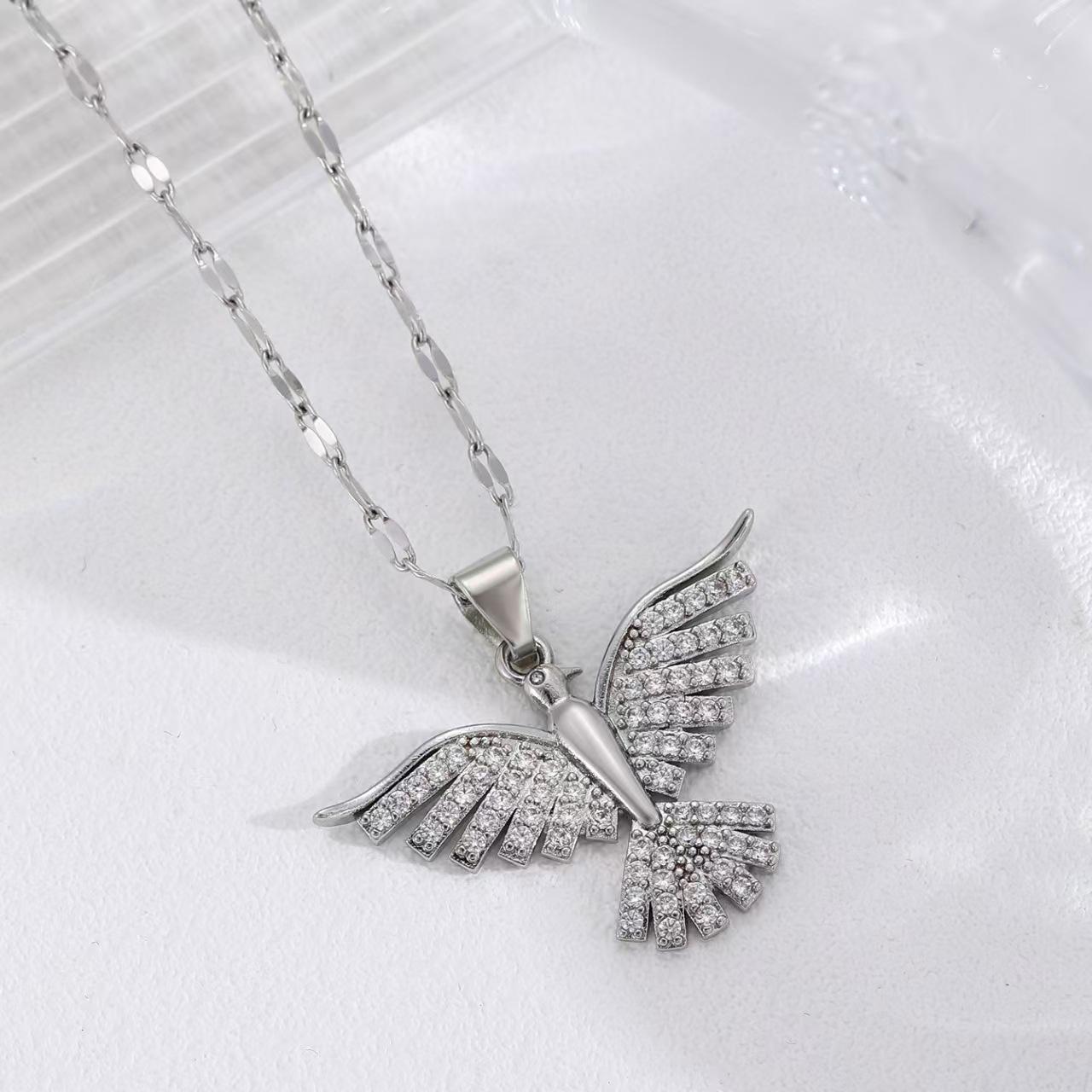 

Phoenix wings light luxury banquet wedding necklace female Internet celebrity wild collarbone chain copper inlaid zircon wild eagle pendant
