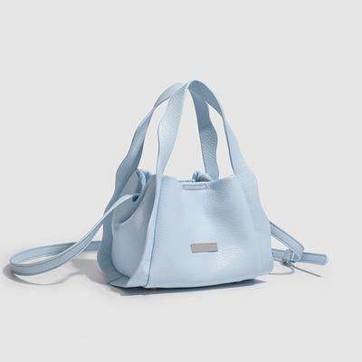 Tragbare Gemüsekorb-Tasche Damen 2025 neu Frühling und Sommer schräge Umhängetasche Eimertasche Pendeln vielseitig einfarbig weiches Leder kleine Tasche