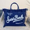 Large Capacity Canvas Tote Bag with Denim Fabric and Tassel Design for Commuting