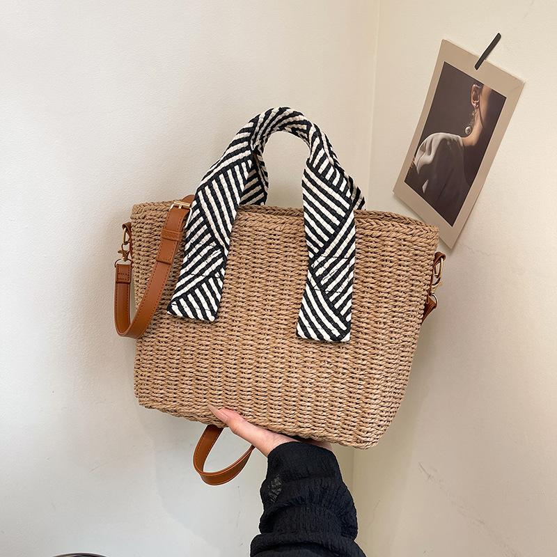 

Holiday style casual beach straw bag women s summer new large-capacity seaside woven shoulder portable tote bag хаки