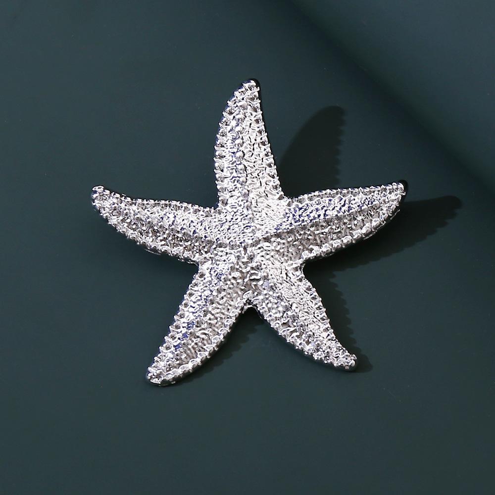 Retro French Alloy Starfish Brooch European and American Light Luxury Simple Gold Textured Ocean Series Corsage 2026