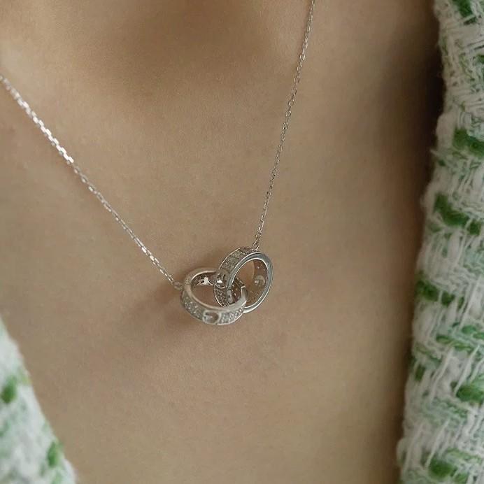 Nouveau collier double anneau entrelacé pour femmes, tendance et polyvalent, collier de Möbius, accessoire de niche