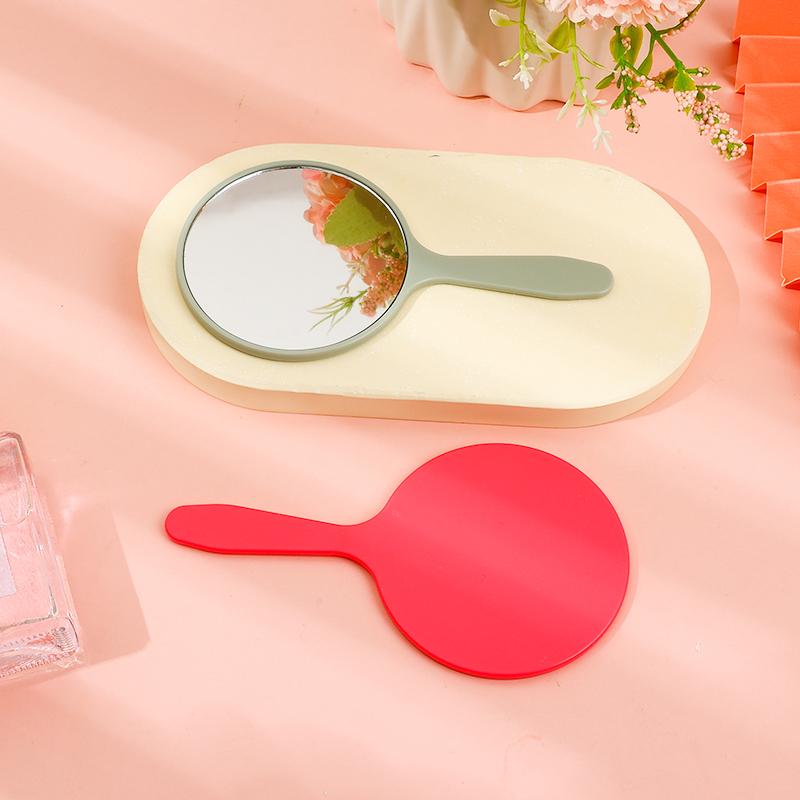 Petit miroir circulaire Miroir de maquillage à main Pour le maquillage des femmes Surface de miroir haute définition Couleurs multiples