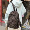 Leopard Print Backpack Casual Daily Use Trendy Street Style Lightweight Backpack for Women with Tassel Detail for School Travel and Everyday Outings