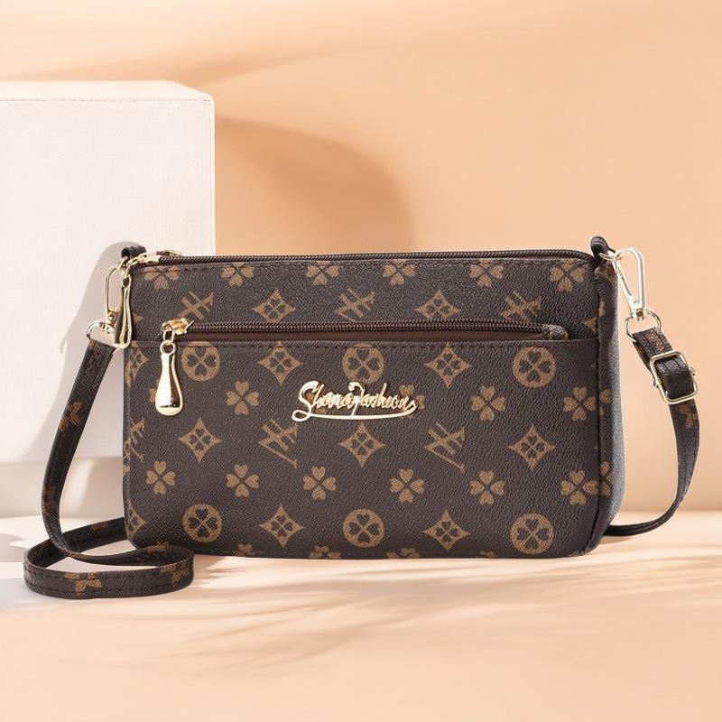 

Mobile phone bag Crossbody women s new old flower armpit bag Fashion trend women s printed women s bag