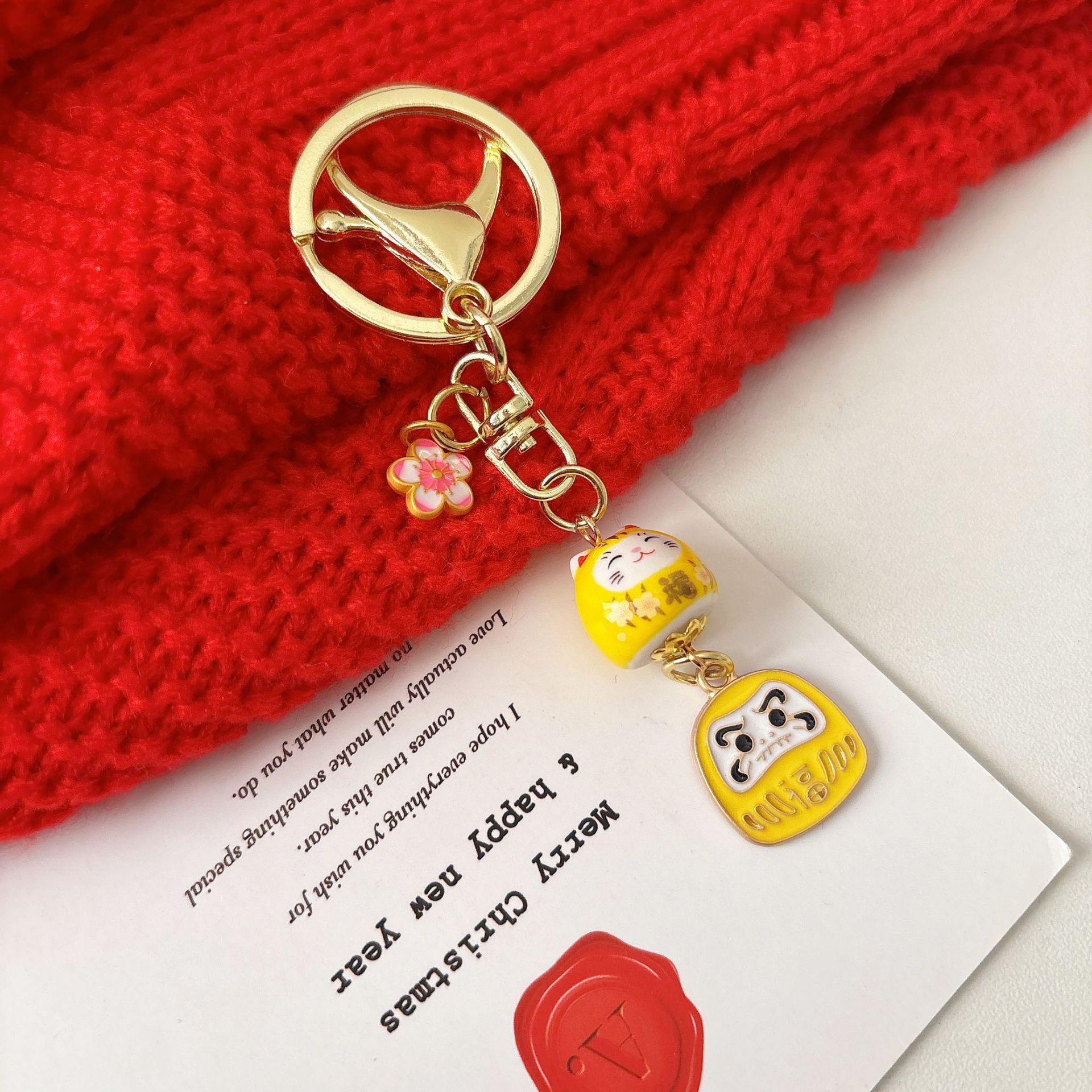 Pink Daruma Beckoning Cat Pendant: Promising Future, Peace & Joy