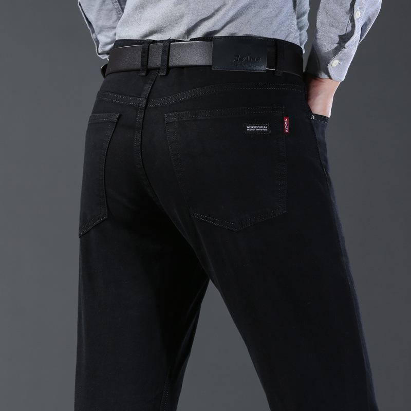 Klasické černé pánské džíny Tenká sekce trendu elastických slim rovných kalhot Business casual kalhoty