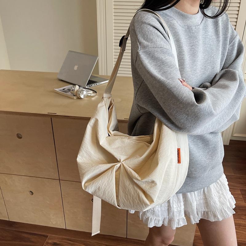 Korean bow bag 2026 summer popular large capacity commuter versatile shoulder bag simple casual messenger bag