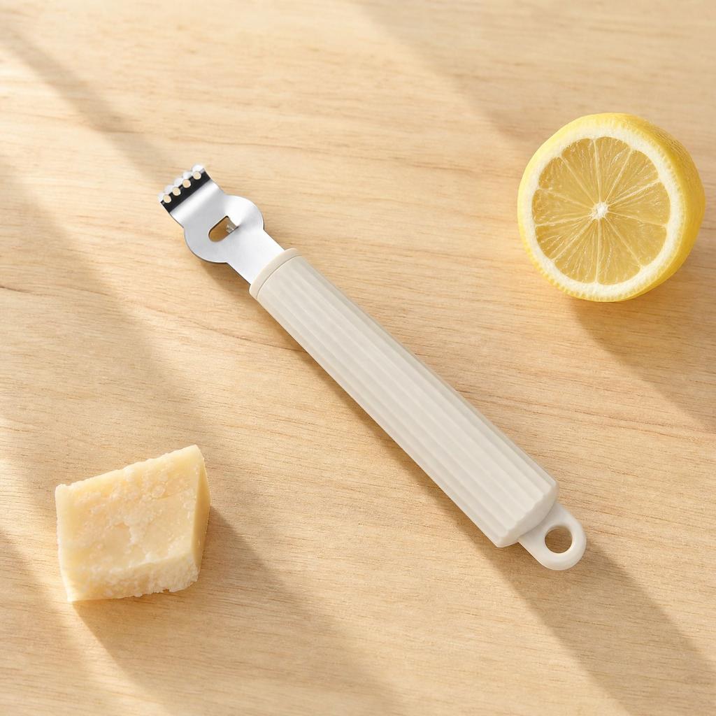 Stainless Multi-Function Grater and Lemon Zester for Kitchen Use