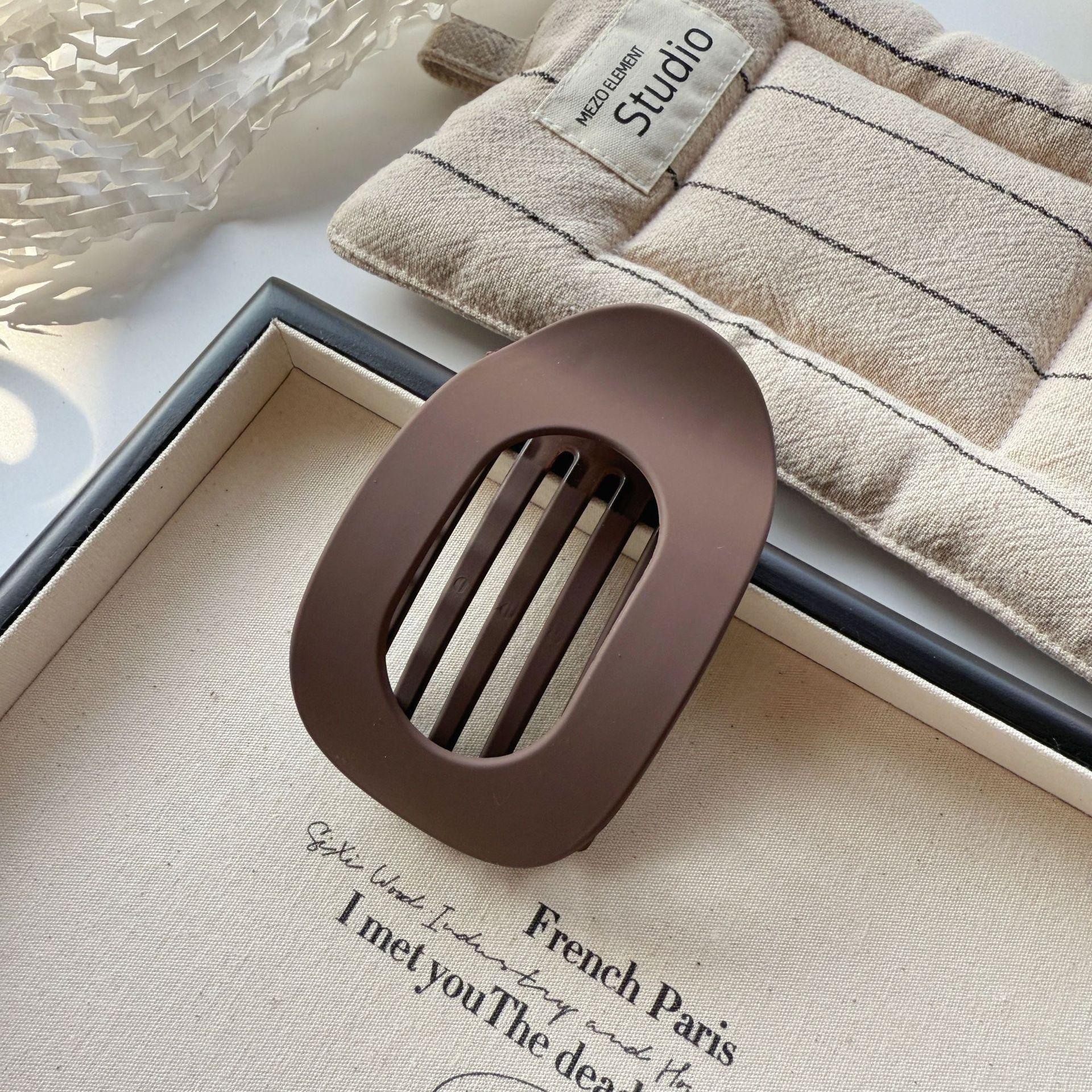 

Матовые плоские заколки для волос для женщин - Сильная фиксация, Нескользящий захват, Стильный черный и коричневый дизайн, Идеально подходят для ежедневной укладки 1pc