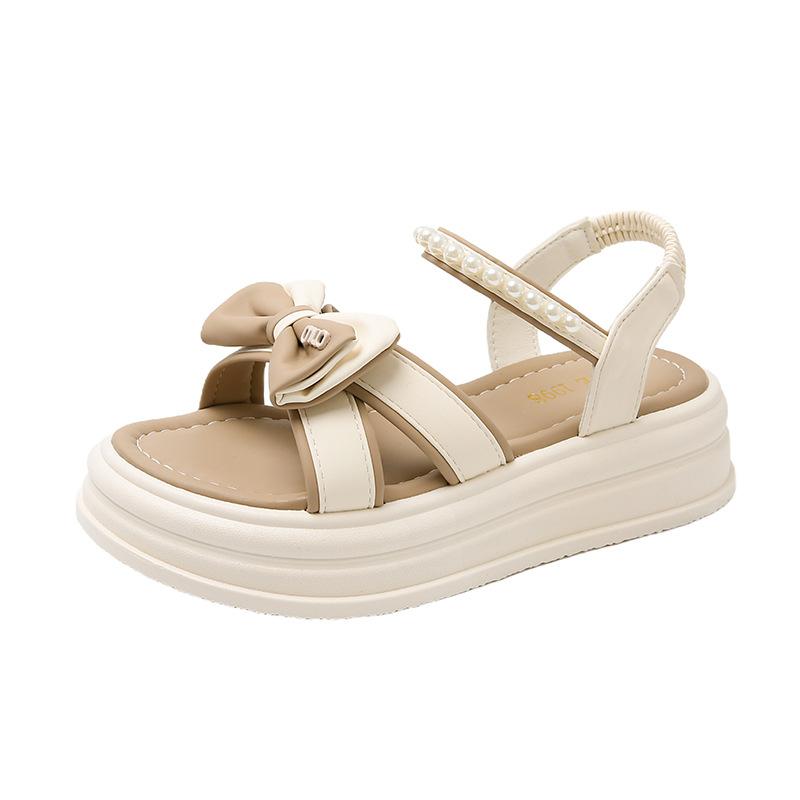 

Bow thick-soled Roman sandals female 2025 summer new outer wear with skirt fairy wind beach pearl sandals 35