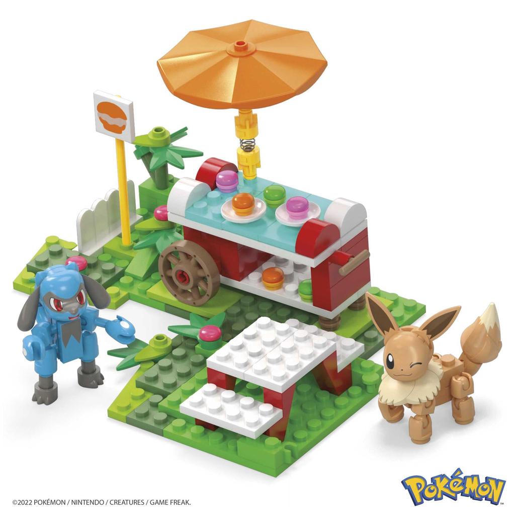 MEGA Pokémon Abenteuerwelt Hügel-Picknick mit Evoli und Riolu - Sonnenschirm und Tischset - [163-teiliges Baustein-Set] [Ab 7 Jahren] HDL80