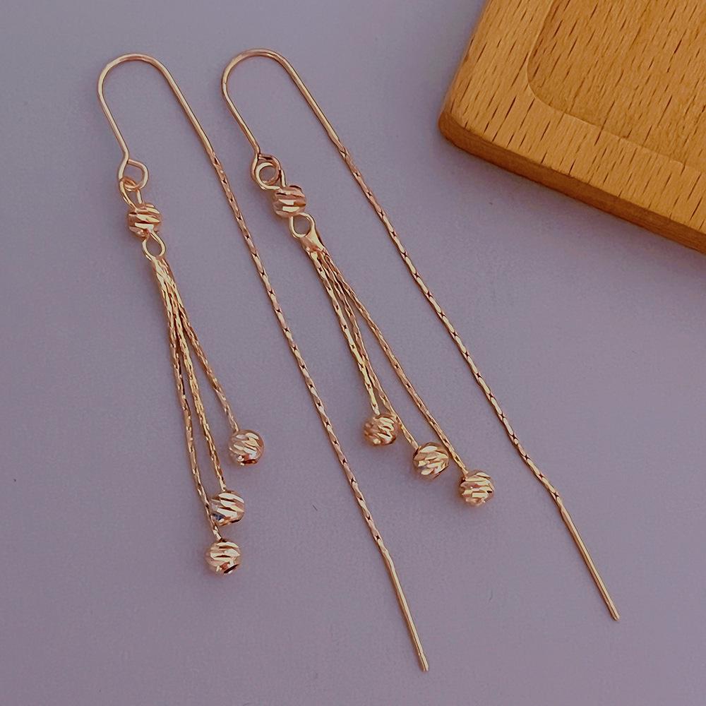 Cat's Eye Tassel Ear Chain 2024 Trend: Elegant Long Earrings with Light Luxury Design
