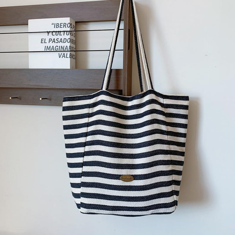Gestreifte kontrastfarbene Canvas-Tasche 2025 neue koreanische Ins-Freizeittasche einzelne Schulter große Kapazität Tragetasche Einkaufstasche