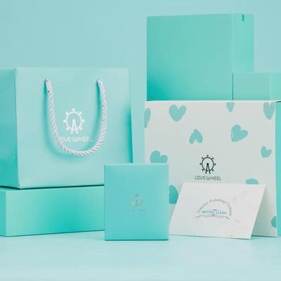Ferris Wheel Gift Set: Box with Top/Bottom Cover, Envelope, Handbag, Jewelry Box, Silver Polishing Cloth.