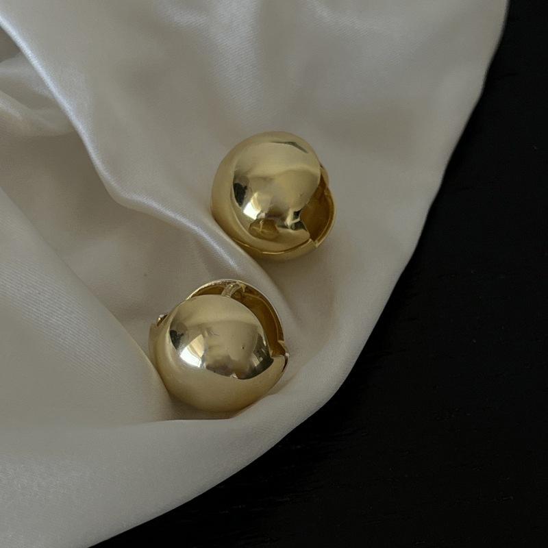 Elegant French Retro Round Ball Earrings for Women - New Needle Back Style, Versatile & Trendy Niche Design.
