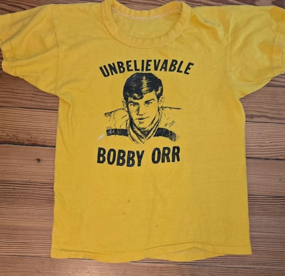 

Бобби Ор НЕВЕРОЯТНАЯ золотая футболка Все размеры от S до 345XL XL