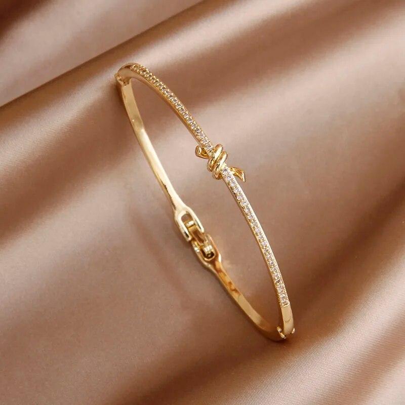 Korea&Japanese Delicate Hollow Knot Charm Bangles for Women Fashion Brand Jewelry Crystal Twist Bracelets Accessories