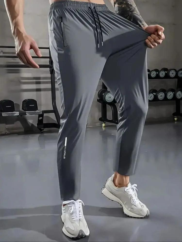 Herren Freizeit-Sporthose, Hochdehnbare Webware, Einfarbig, Normale Passform mit Kordelzugbund und Reißverschluss