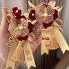 Accesorii de nuntă – Cocarde
