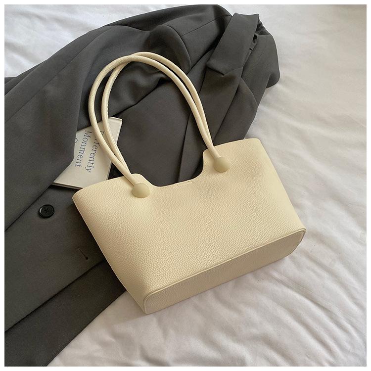 

2025 spring and summer new girls fashion handbag foreign style simple solid color shoulder bag women s bag large capacity tote bag