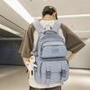 Solid color multi-pocket schoolbag female Korean version high school college student backpack light color couple large capacity ins backpack