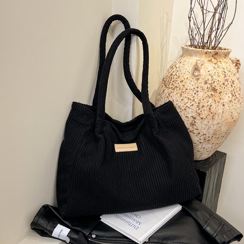 This year's popular fashion Korean version of solid color handbag 2025 early spring new foreign style shoulder underarm bag tote bag women