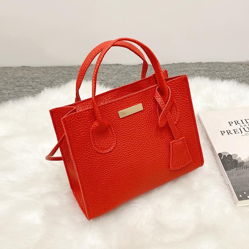 Damenhandtasche, Handytasche, Kosmetiktasche, kleine Einkaufstasche mit Litschi-Muster.