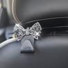 Car Headrest Hooks Shiny Rhinestone Bow Ornament Super Load Bearing Sturdy Universal Auto Hangers for Groceries Handbags Clothes