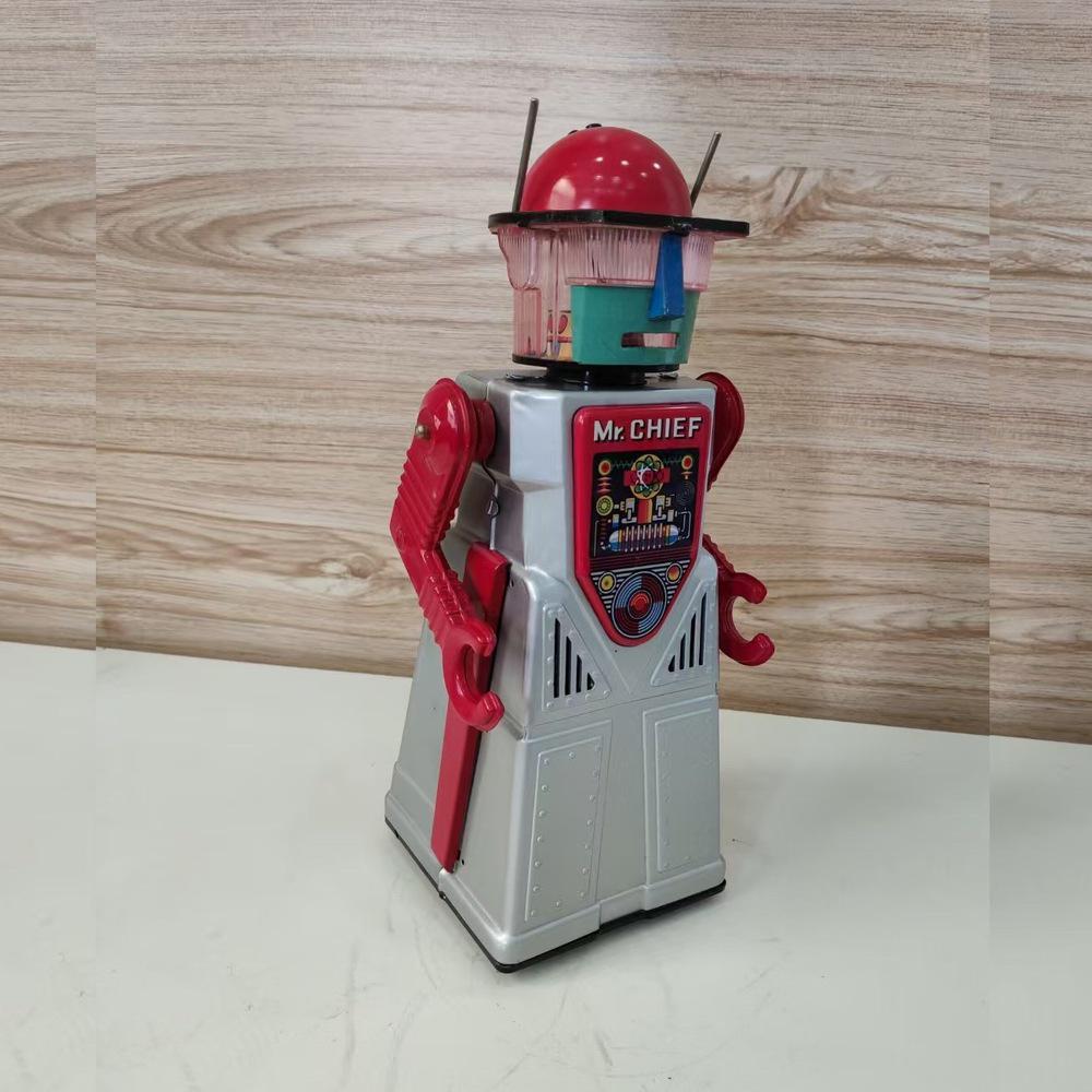 TR2054 Retro Tin Robot: Electric Smoke-Emitting Toy Skirt, Post-80s Nostalgic Collection & Creative Festival Gift. серебряный