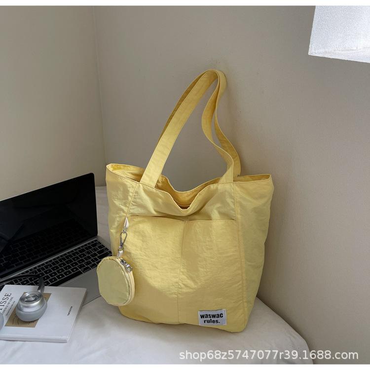 Japanese new waterproof nylon casual spring and summer shoulder bag women's design sense large-capacity commuter tote bag